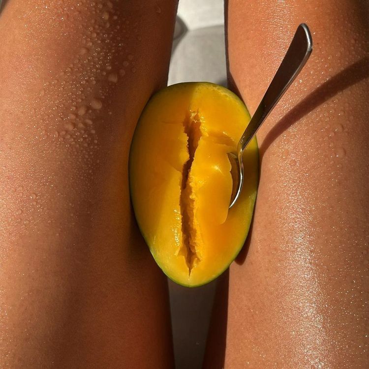 Sun-warmed tan detail with fresh mango